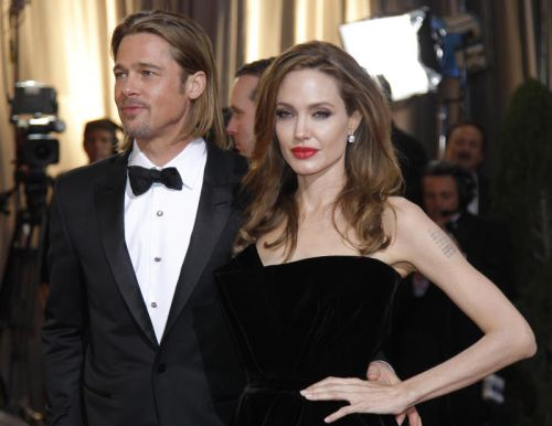 Pasangan Angelina Jolie (kanan) dan Brad Pitt yang mendapat jolokan Brangelina.